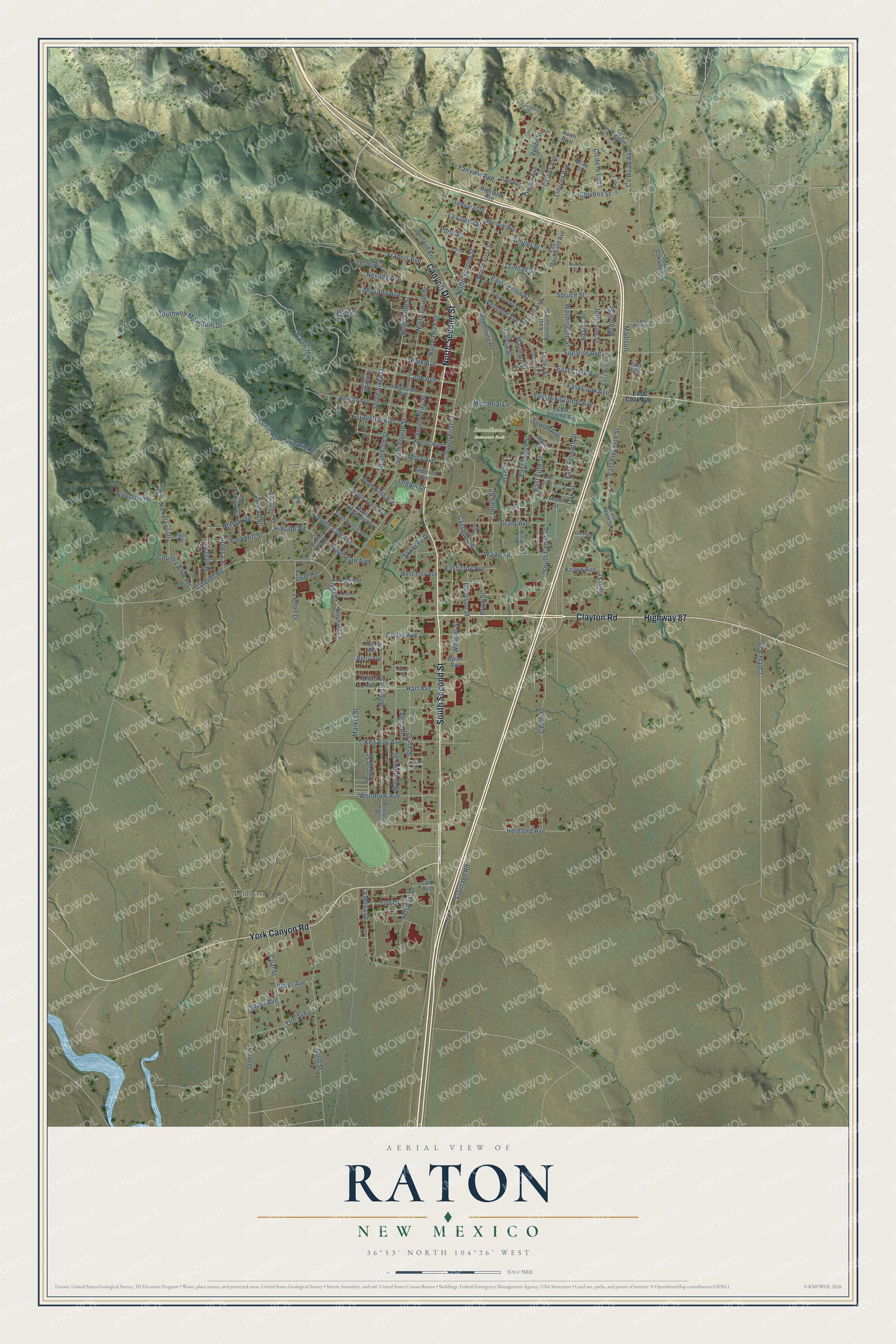 Full map of Raton, New Mexico, with red buildings, printed street names and the land around them