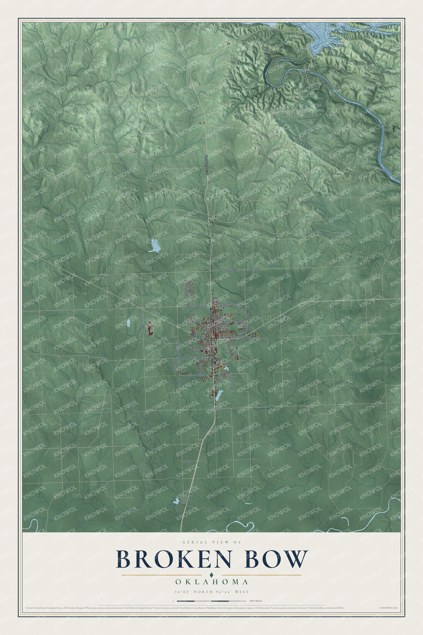 Full map of Broken Bow, Oklahoma, with red buildings, printed street names and the land around them