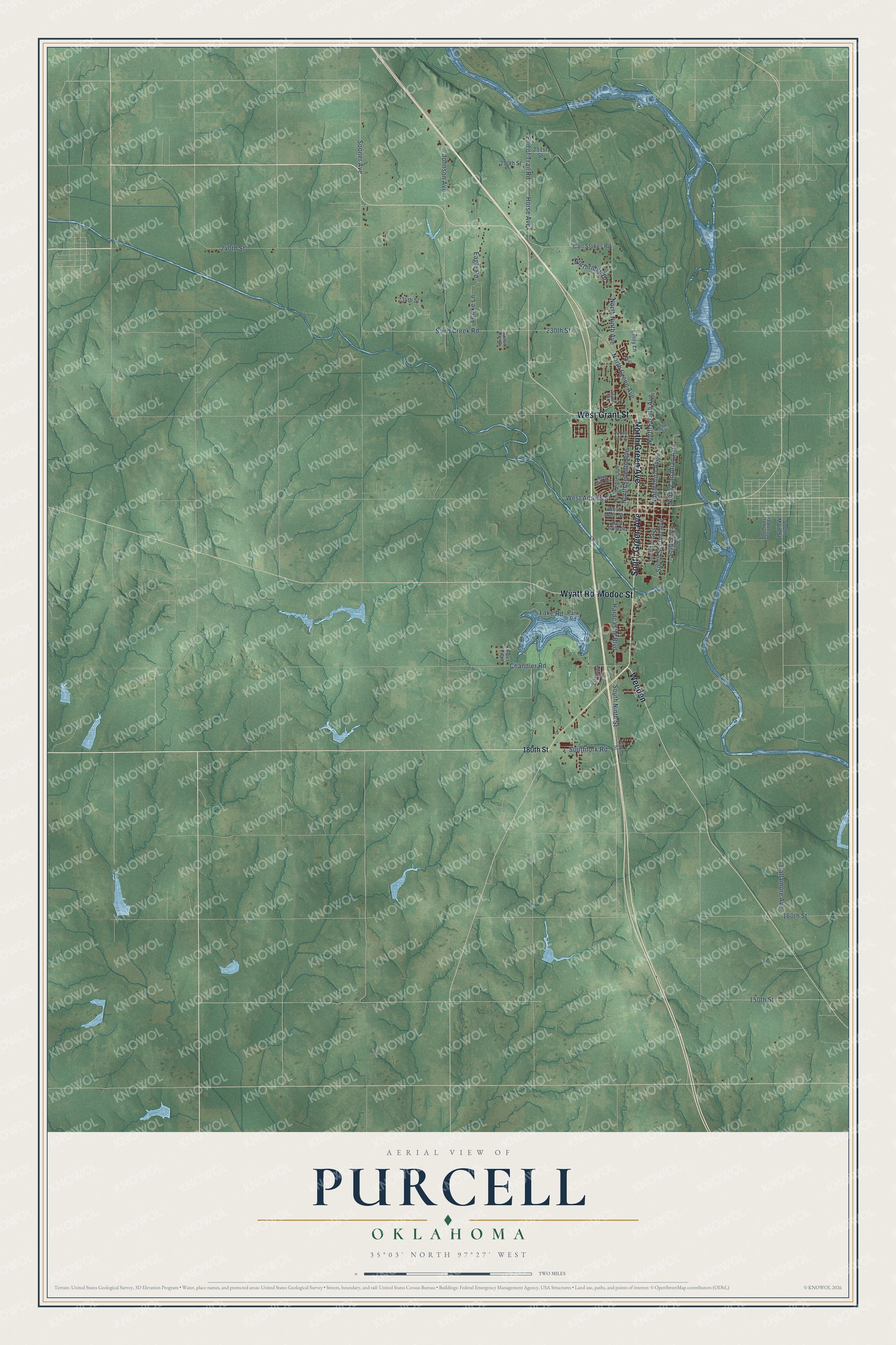 Full map of Purcell, Oklahoma, with red buildings, printed street names and the land around them