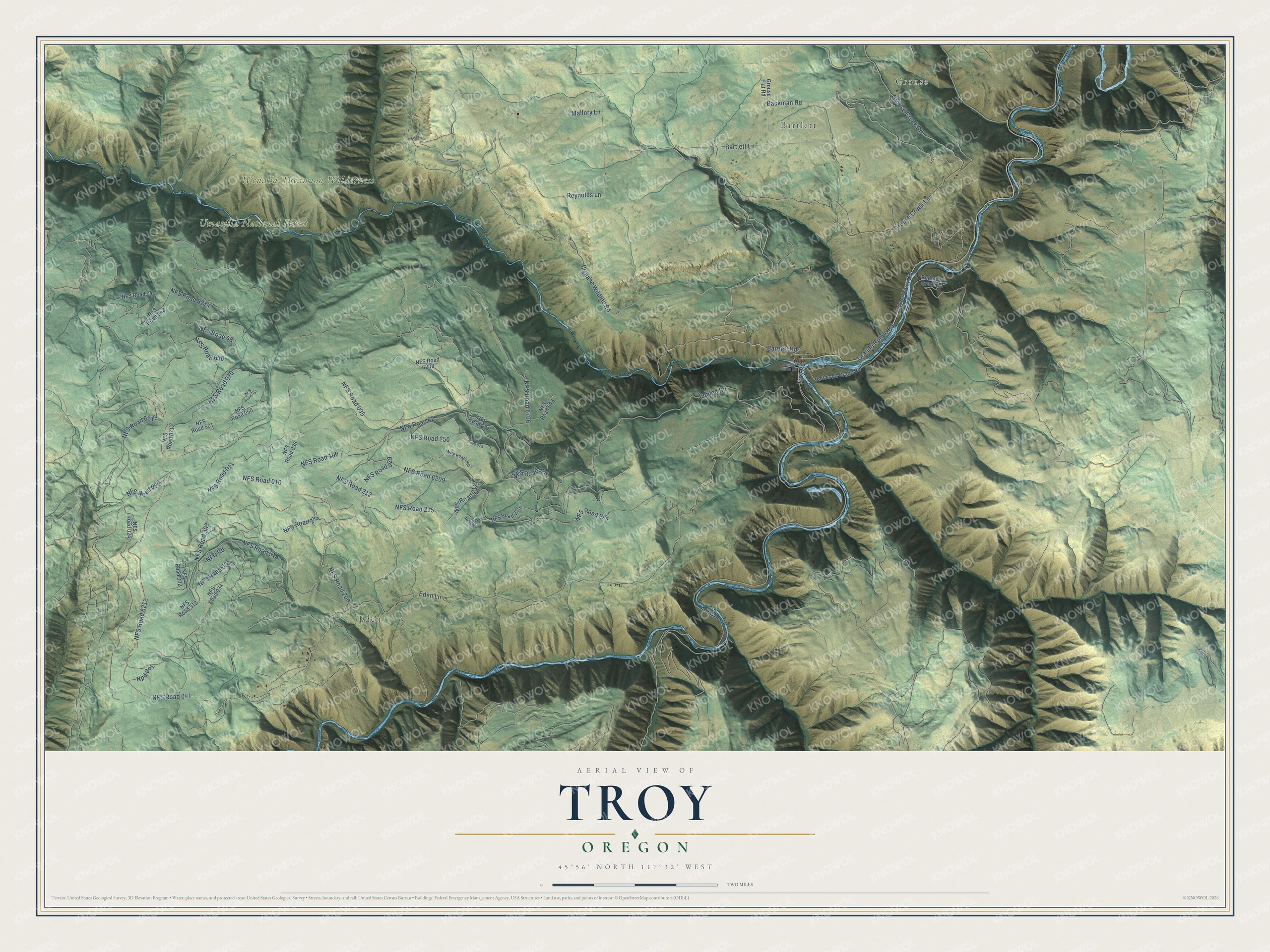 Full map of Troy, Oregon, with red buildings, printed street names and the land around them