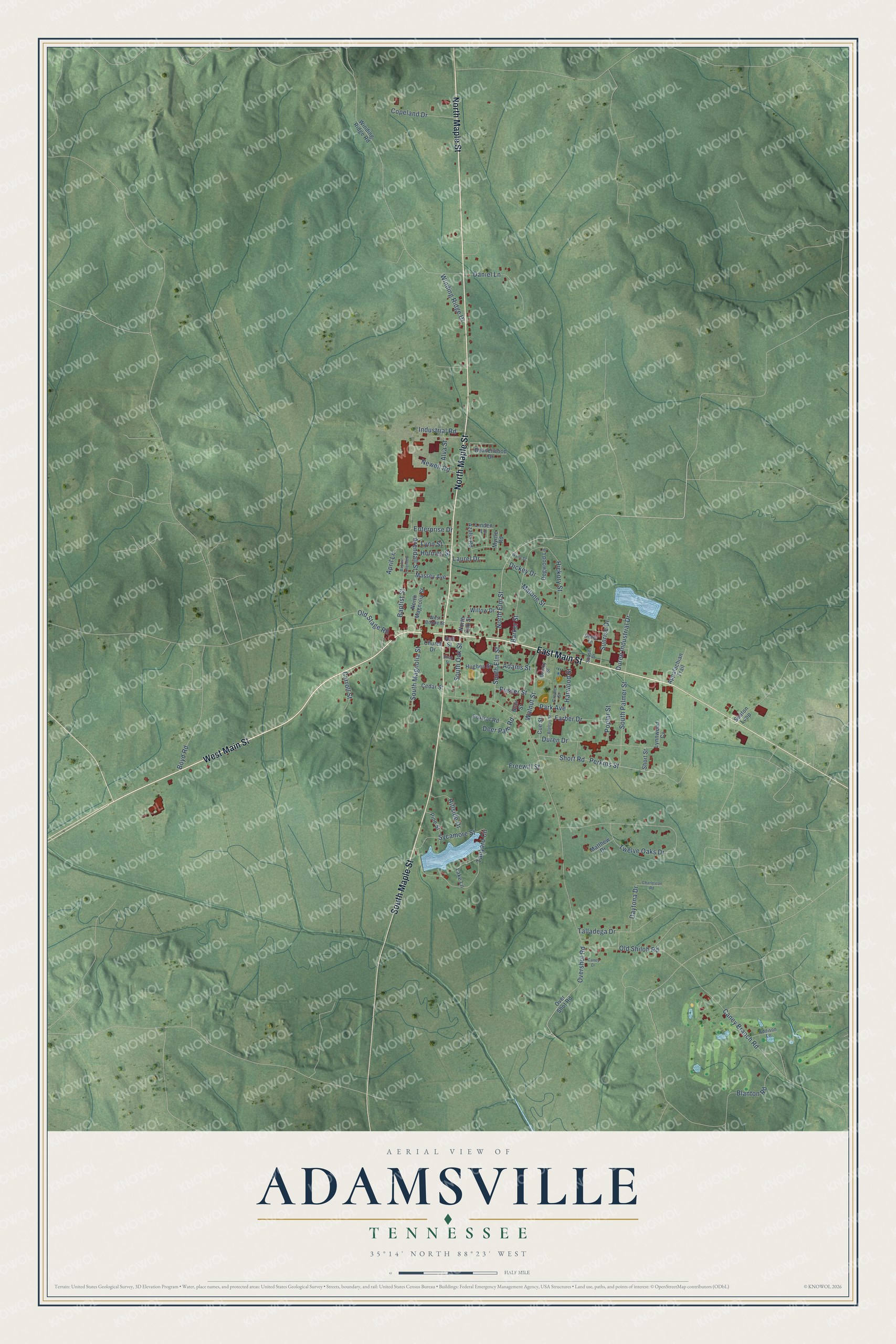 Full map of Adamsville, Tennessee, with red buildings, printed street names and the land around them