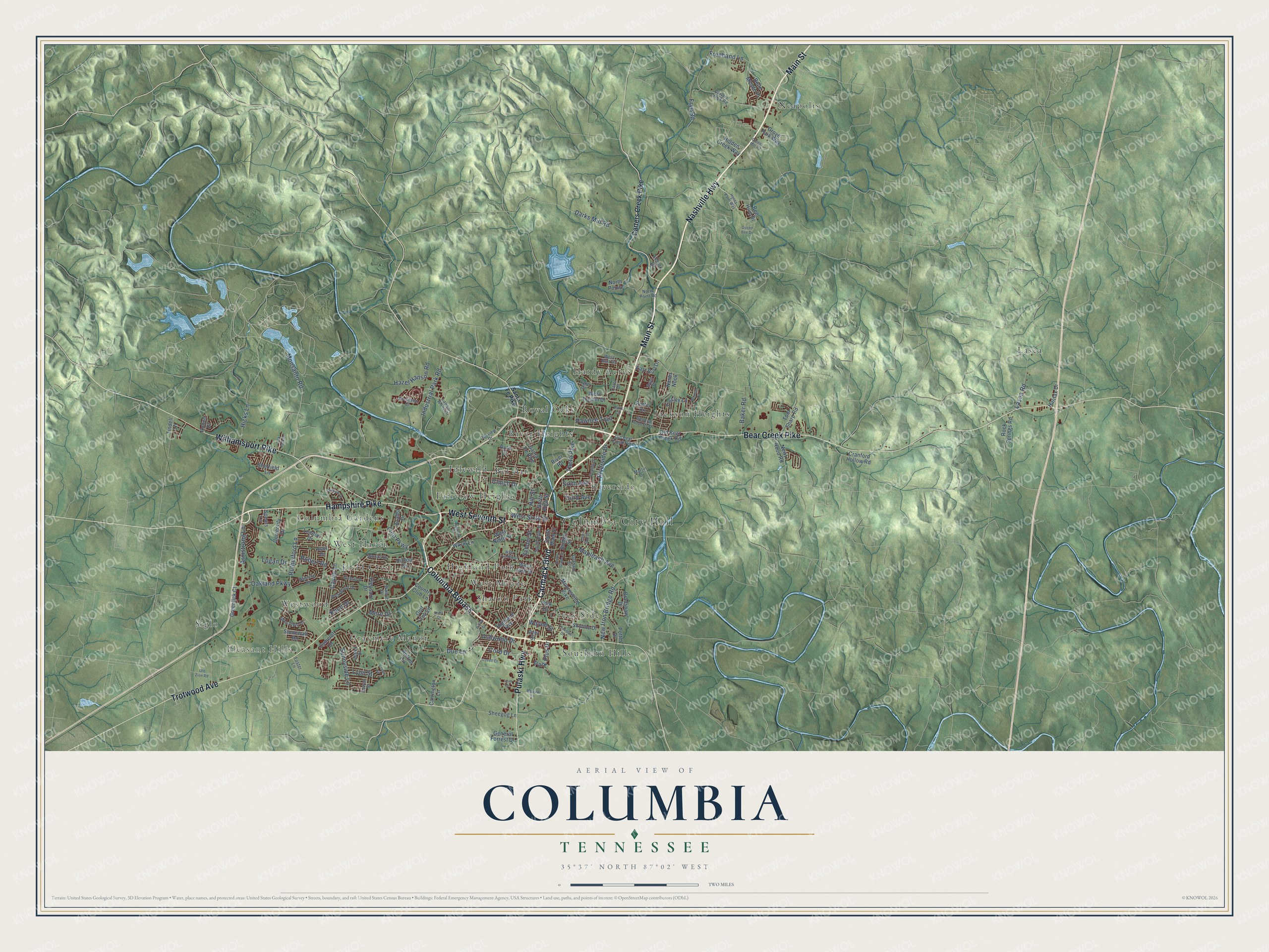 Full map of Columbia, Tennessee, with red buildings, printed street names and the land around them