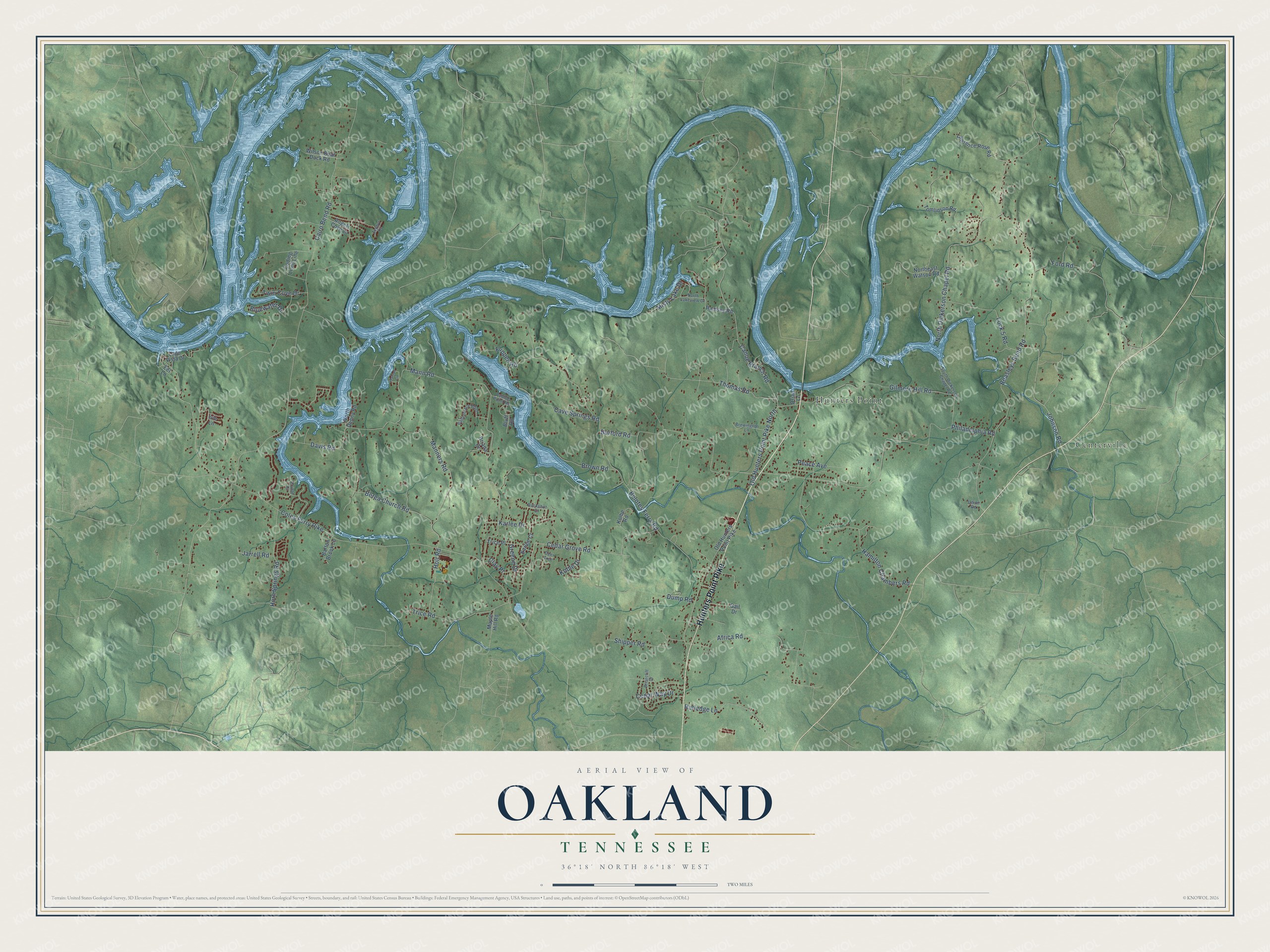 Full map of Oakland, Tennessee, with red buildings, printed street names and the land around them