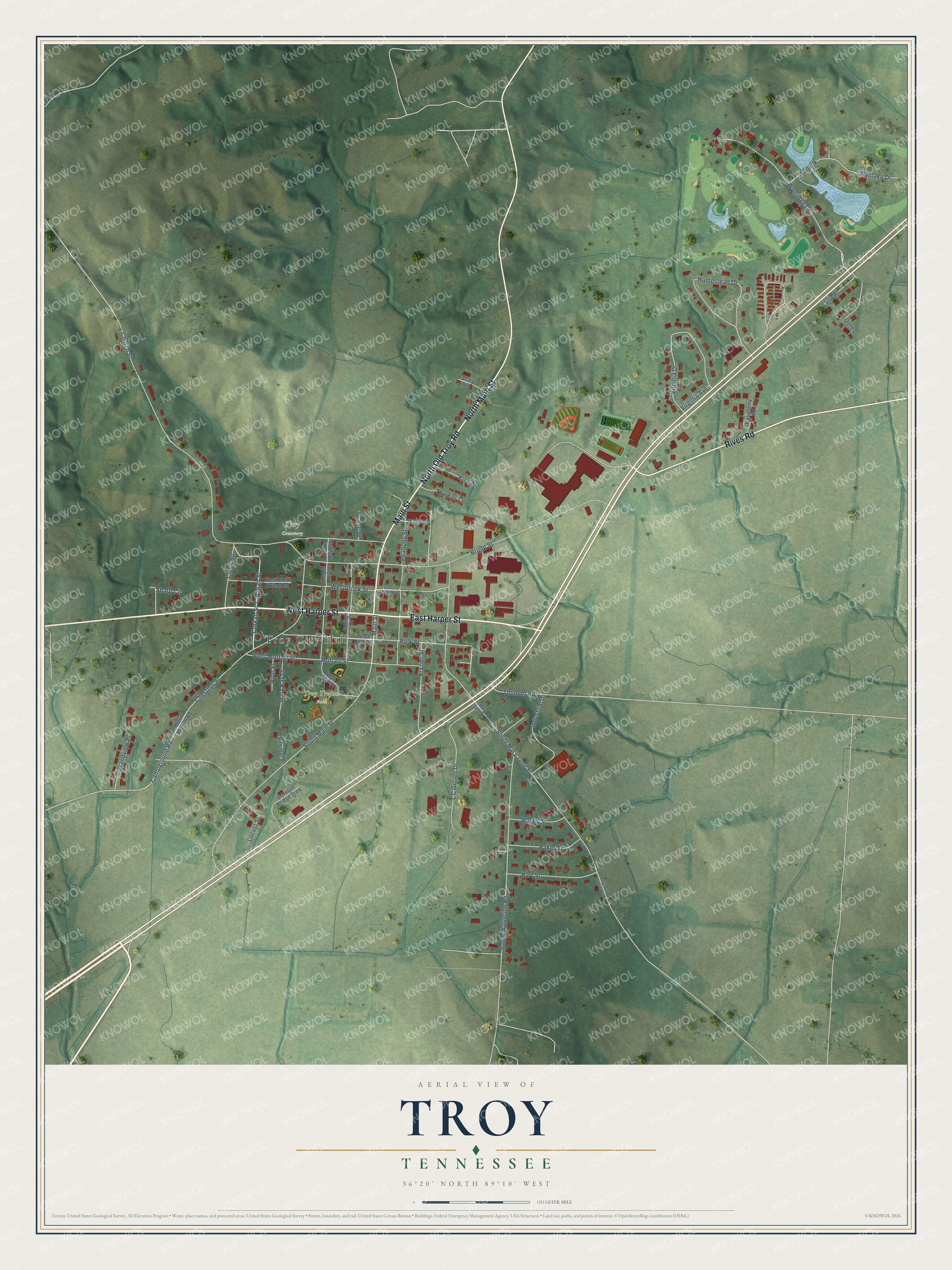 Full map of Troy, Tennessee, with red buildings, printed street names and the land around them