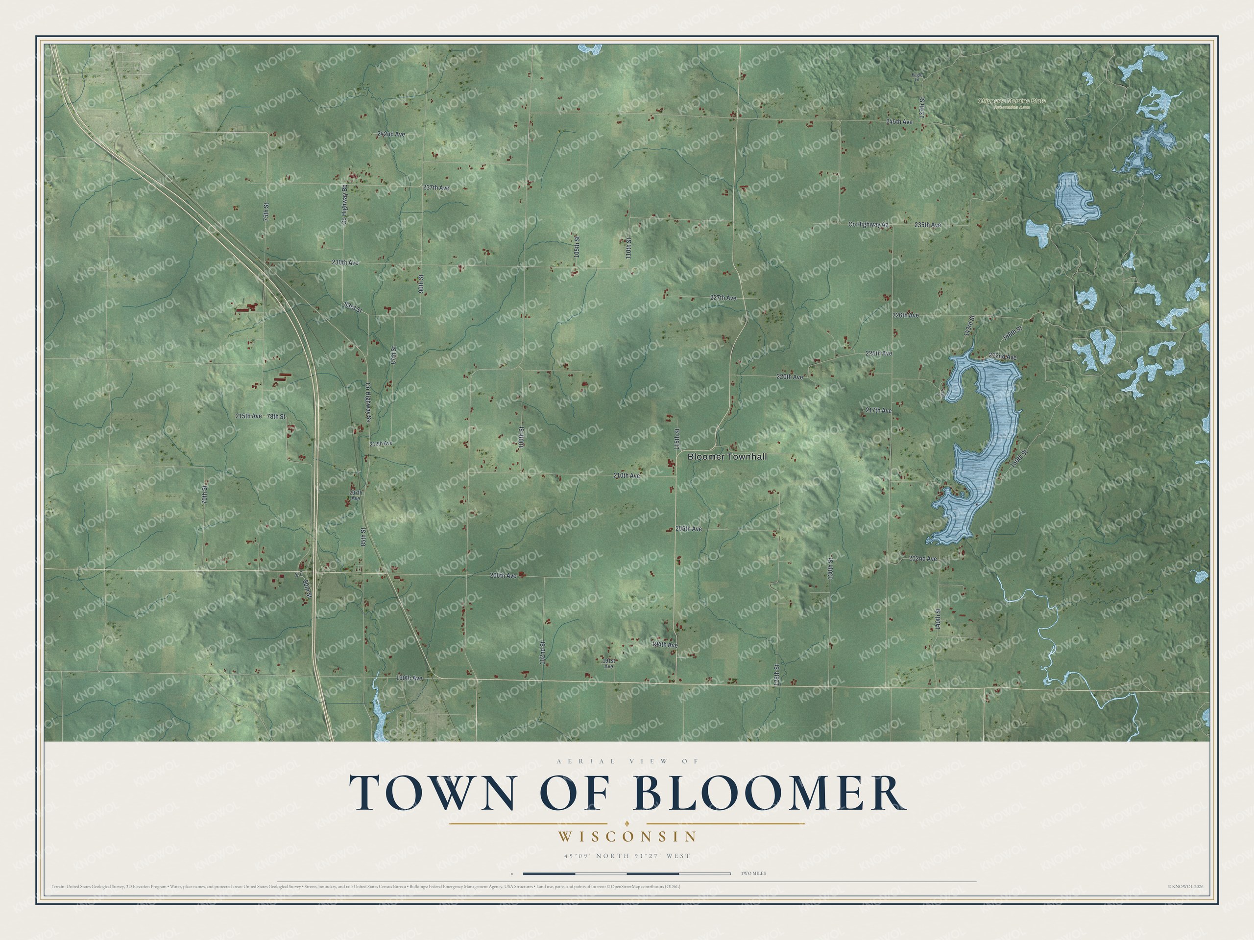 Full map of Bloomer, Wisconsin, with red buildings, printed street names and the land around them