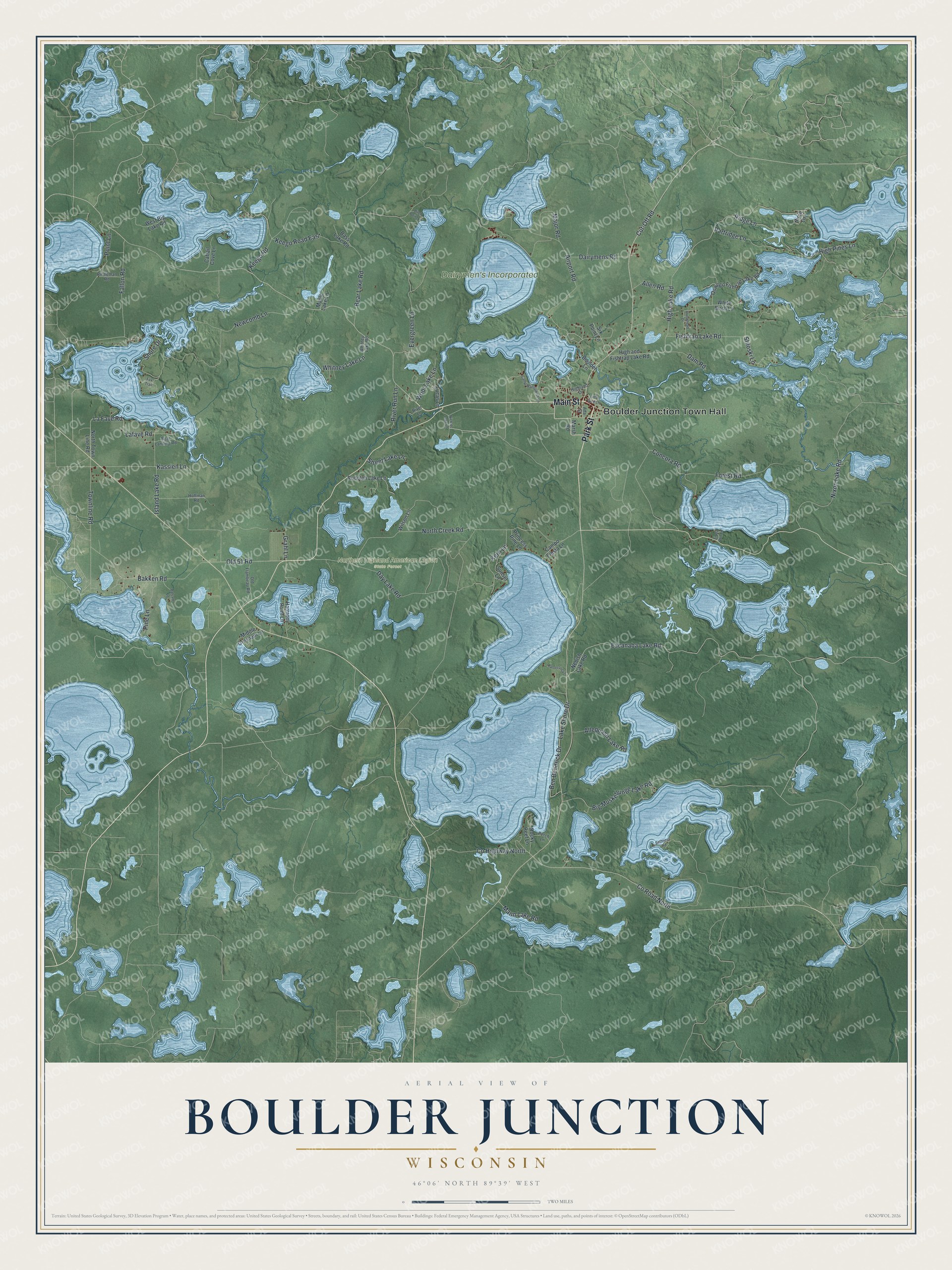 Full map of Boulder Junction, Wisconsin, with red buildings, printed street names and the land around them