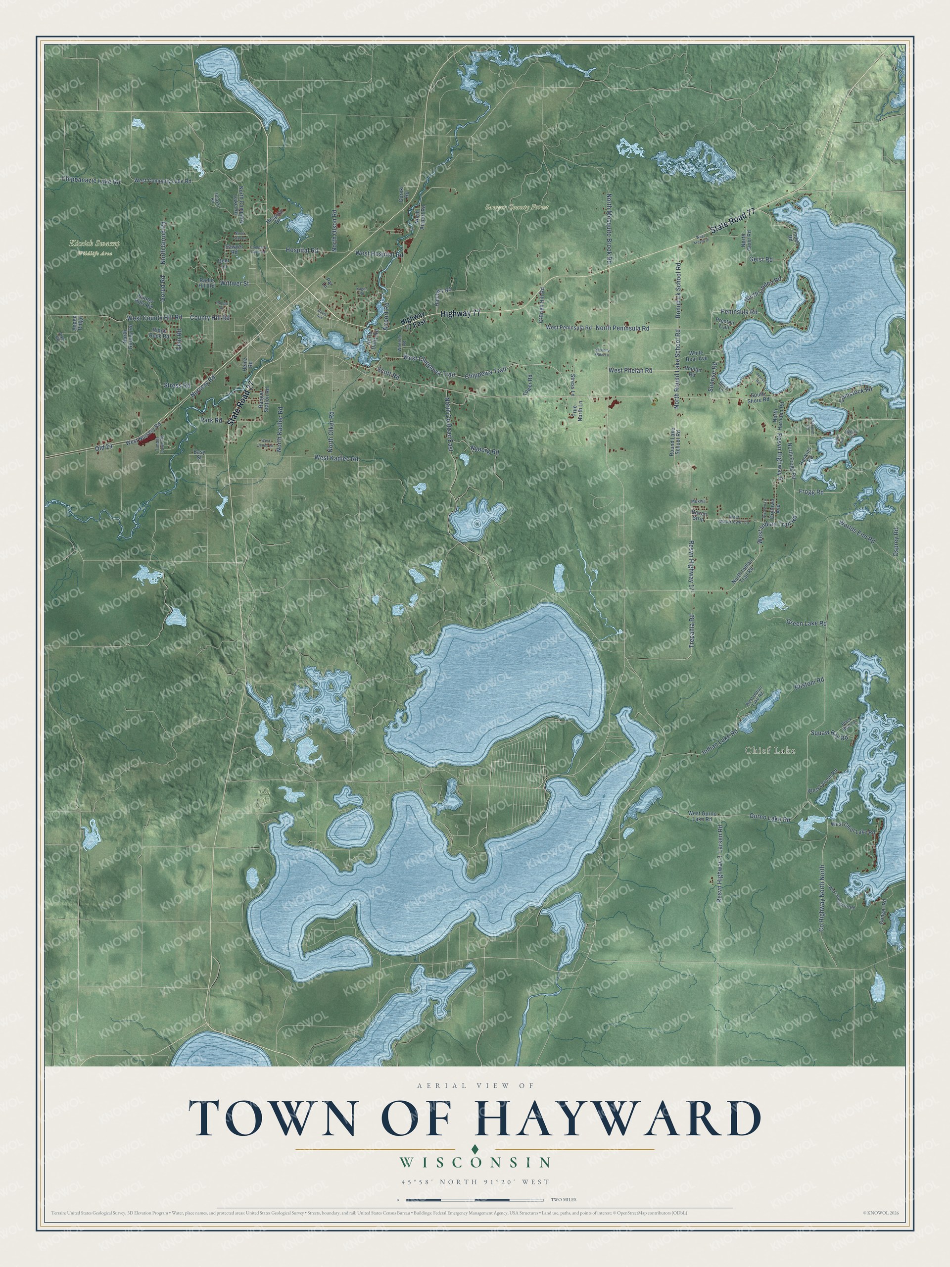 Full map of Hayward, Wisconsin, with red buildings, printed street names and the land around them
