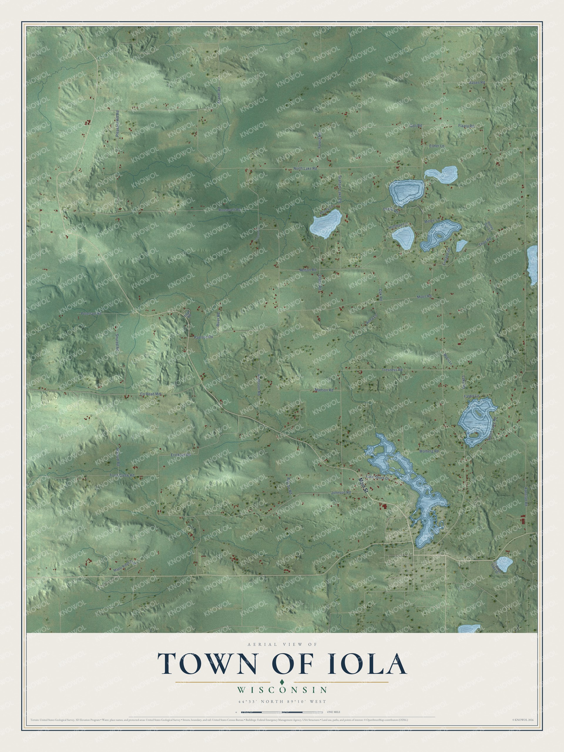 Full map of Iola, Wisconsin, with red buildings, printed street names and the land around them
