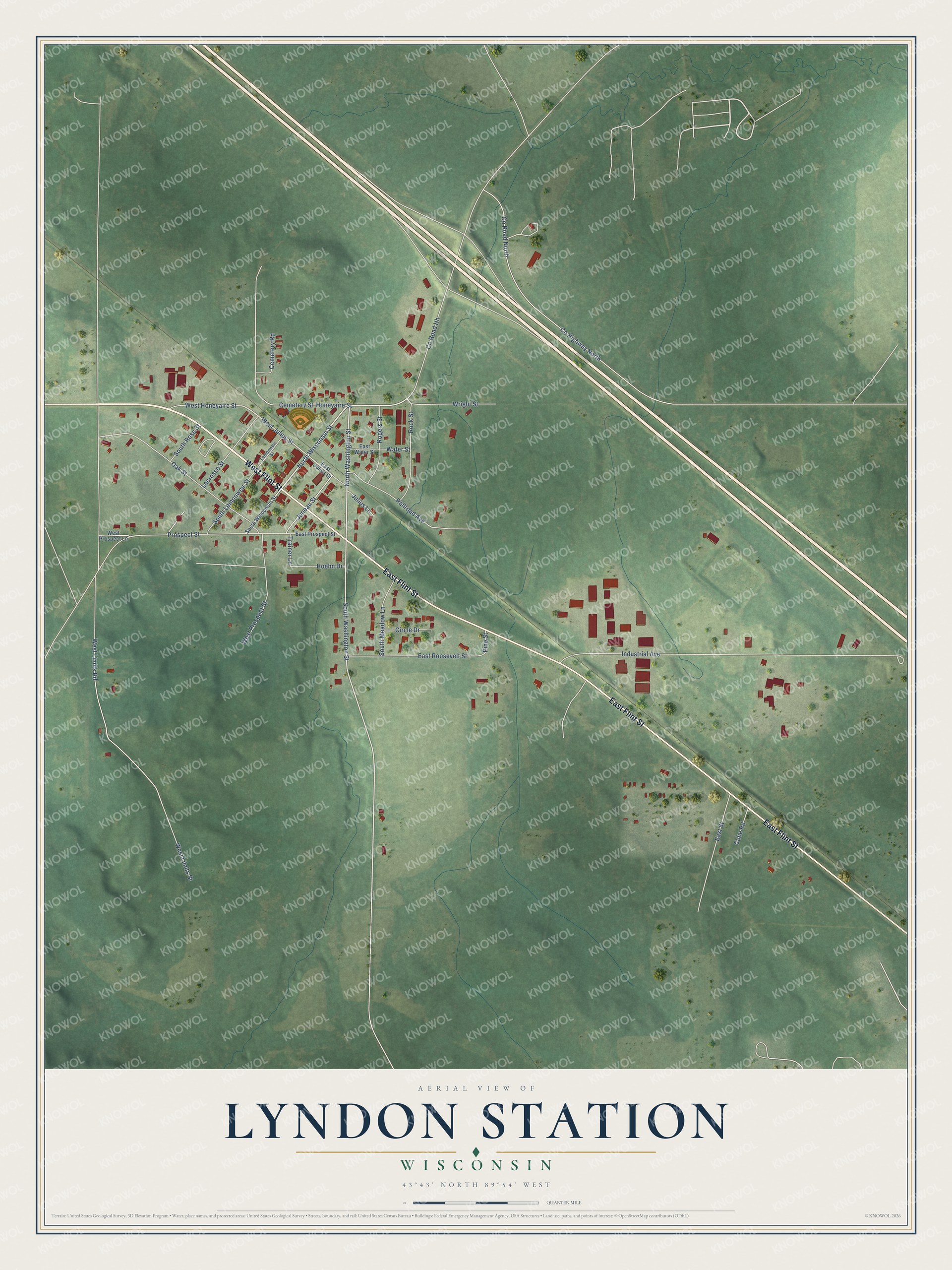 Full map of Lyndon Station, Wisconsin, with red buildings, printed street names and the land around them