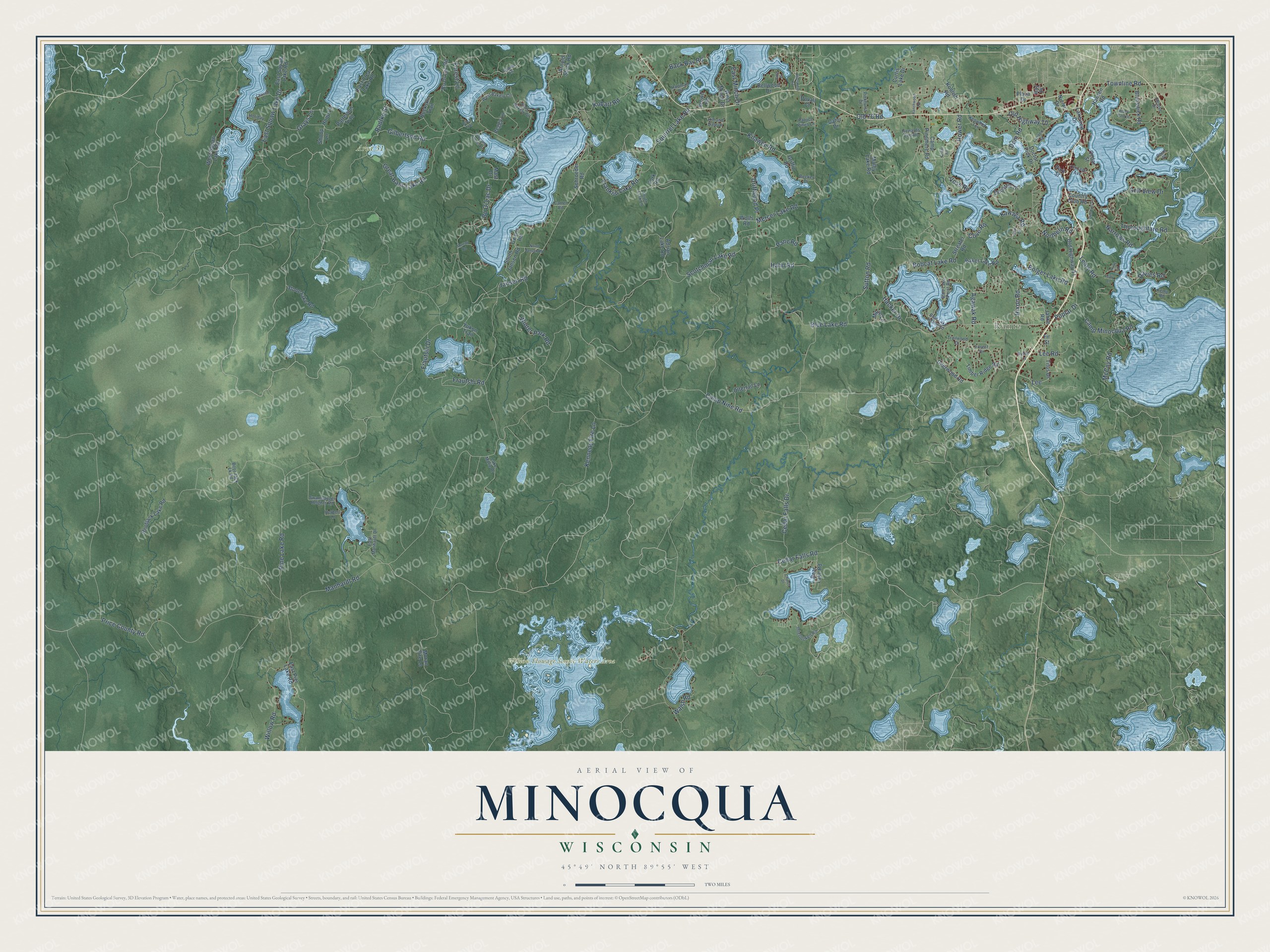Full map of Minocqua, Wisconsin, with red buildings, printed street names and the land around them