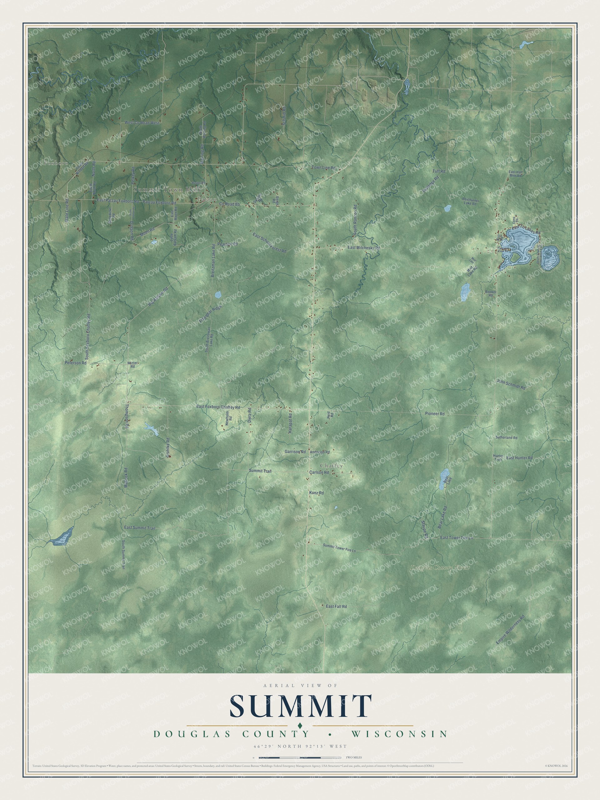 Full map of Summit, Wisconsin, with red buildings, printed street names and the land around them