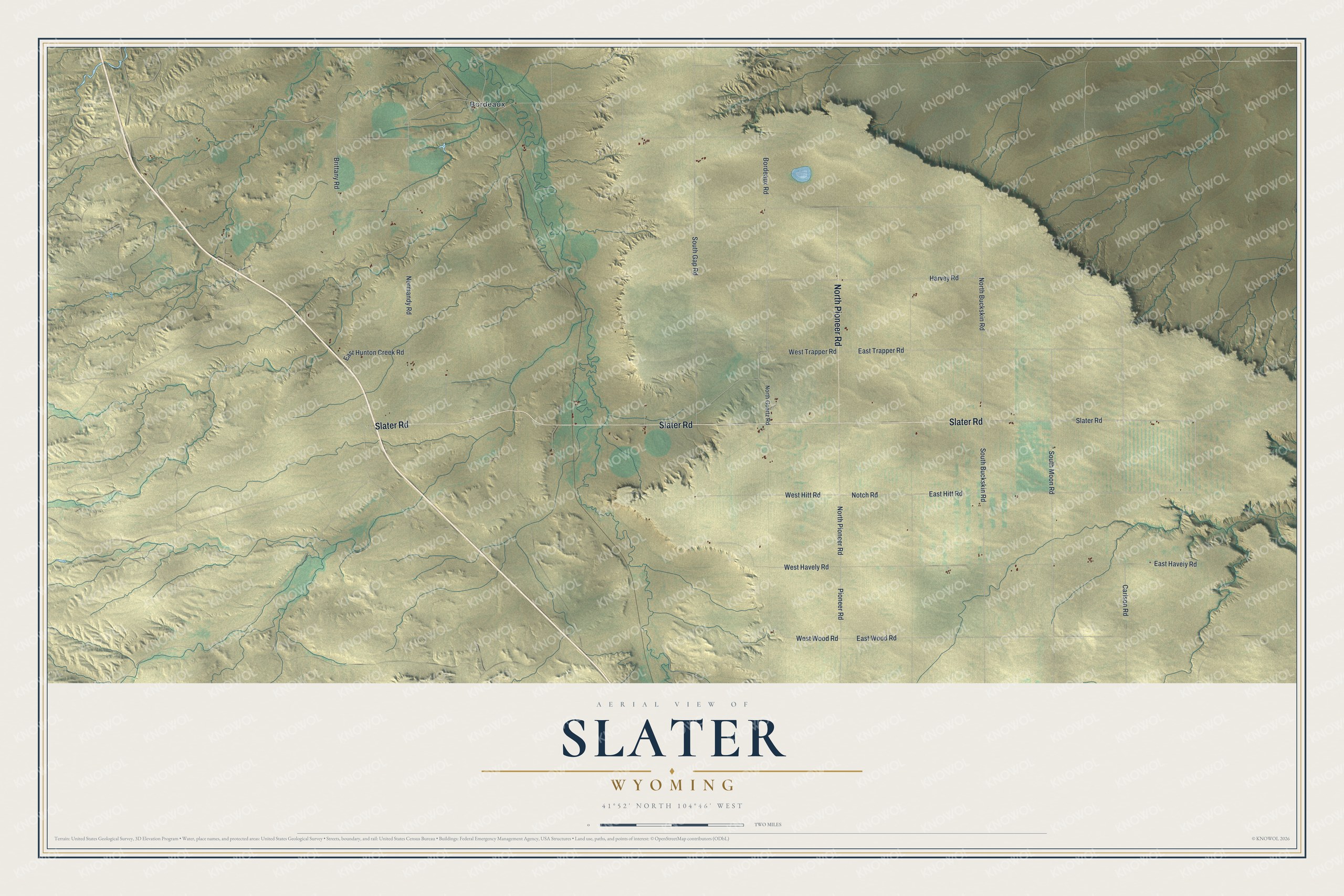 Full map of Slater, Wyoming, with red buildings, printed street names and the land around them